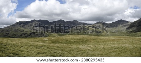 Panorama of the Sca Fell range from Eskdale with Sca Fell to the left, Scafell Pike, Esk Pime and Bowfell, Lake District, UK