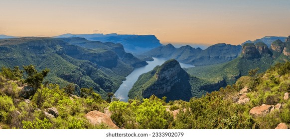 Panorama shot of the Blyde River Canyon, dam and the mountains with lush foliage, Panorama Route, Graskop, Mpumalanga, South Africa