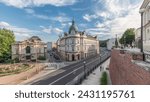 Panorama showing Theater Square with Main Post Office building aerial timelapse and Polish Theater, both built in 1890s, view from the Castle hill. Traffic on the street. Bielsko-Biala, Poland