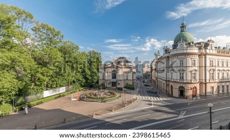 Panorama showing Theater Square with Main Post Office building aerial timelapse and Polish Theater, both built in 1890s, view from the Castle hill. Traffic on the street. Bielsko-Biala, Poland