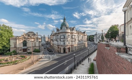 Panorama showing Theater Square with Main Post Office building aerial timelapse and Polish Theater, both built in 1890s, view from the Castle hill. Traffic on the street. Bielsko-Biala, Poland