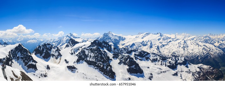 Panorama of the snow mountain range mountain range from the Titlis is a mountain of the Uri Alps Engelberg, Switzerland. - Shutterstock ID 657951046