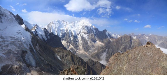 Panorama of snow-capped peaks of the main Caucasian ridge
