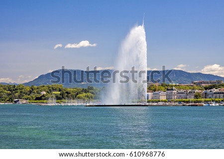panorama of the southern lake geneva shore and of the famous jet d'eau (water jet) fontain. canton geneva, switzerland