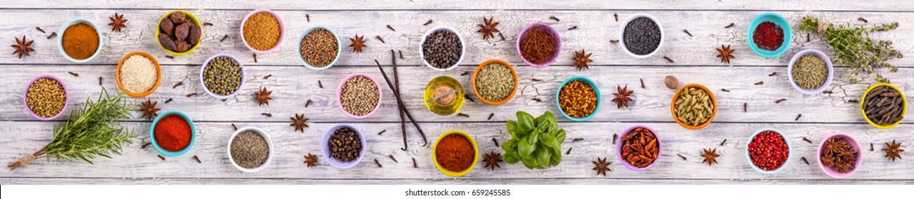 Panorama of spices and herbs on a wooden background - Powered by Shutterstock