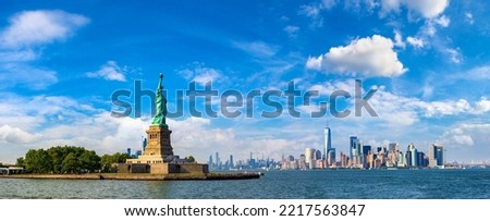Panorama of  Statue of Liberty against Manhattan cityscape background in New York City, NY, USA