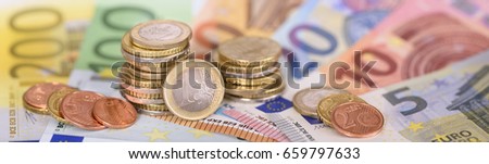 panorama still of Euro  banknotes and coins of european currency