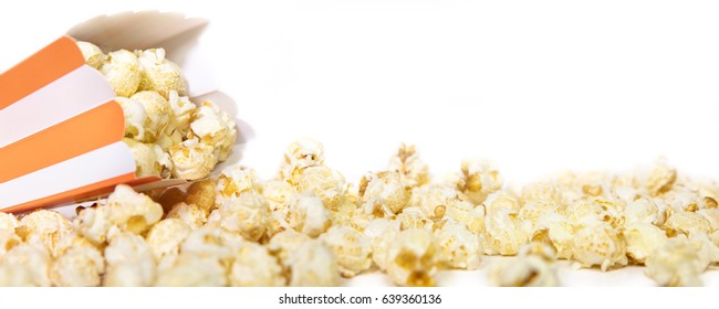 Panorama, striped orange Popcorn box in front of white, copyspace - Powered by Shutterstock