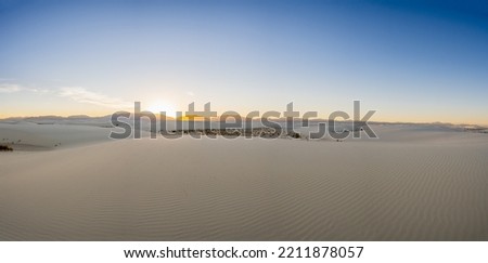 Panorama Of Sun Setting Over The Vast Emptiness of White Sand Dunes in New Mexico