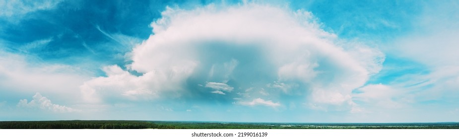 Panorama Sunny Sky Background. Natural Bright Dramatic Sky Daytime. Saturated Blue And White Colors. Cumulus Cloudy Panoramic View.