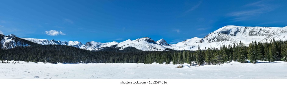 Panorama Sunny Winter Landscape of Indian Peaks at Brainard Lake Recreation Area Colorado