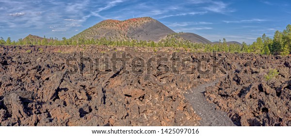 Panorama of\
Sunset Crater Volcano from the Lava Edge Trail in the Bonito Lava\
Field west of the volcano. The Sunset Crater Volcano National\
Monument is located north of Flagstaff\
AZ.
