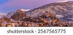 Panorama of the Swiss castles of Valere Basilica and Tourbillon at sunset time,  Sion, Canton of Valais, Switzerland