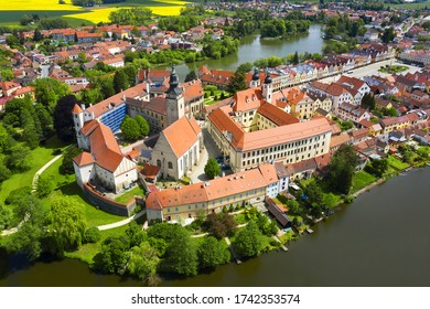 Panorama of Telc. Telc is a town in southern Moravia in the Czech Republic. Telc Castle and city reflected in lake. The historic center of Telc is a UNESCO World Heritage Site