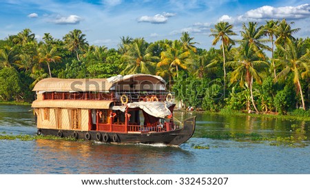 Panorama of tourist houseboat on Kerala backwaters. Kerala, India