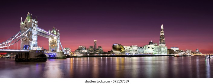 Panorama of the Tower Bridge until London Bridge with London Skyline after sunset
