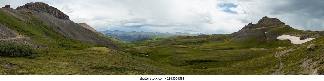 Panorama Of The Tundra Covered Mountains With Rain Cloud Skies