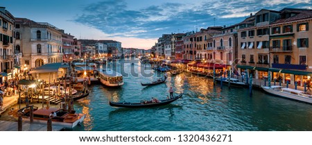Panorama of Venice at night, Italy. Beautiful cityscape of Venice in evening. Panoramic view of Grand Canal at dusk. It is one of main tourist attractions of Venice. Urban landscape of Venice city.