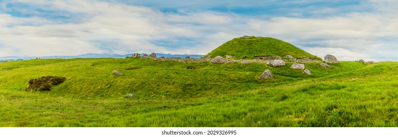 A panorama view across the Cairnpapple Hill burial site in Scotland on a summers day  - Shutterstock ID 2029326995