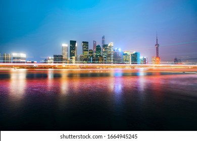 Panorama View Of Aerial Shanghai City Scape At Night Time.