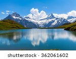 Panorama view of Bachalpsee and the snow coverd peaks including Schreckhorn, Wetterhorn with glacier of swiss alps, on Bernese Oberland, Switzerland.