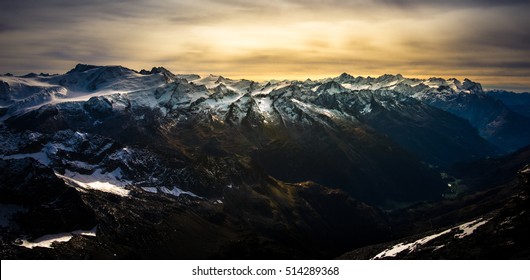 Panorama view of the beautiful Alps with snow-capped mountain at sunset, Switzerland. - Shutterstock ID 514289368