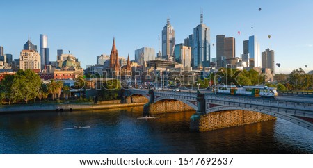 Panorama view of beautiful Melbourne cityscape skyline at sunrise in Australia .