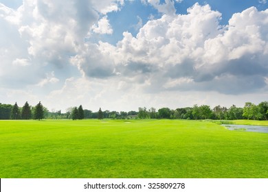 Panorama View Of Beautiful Summer Park With Cloudy Sky