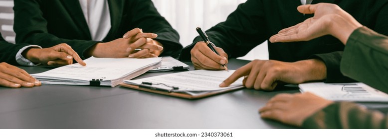 Panorama view of company executive sign business contract with business partner and legal adviser in corporate meeting table. Business people negotiating agreement in conference room concept. Prodigy