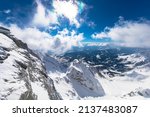 Panorama view from the Dachstein Glacier. The plateau is the best place for skiing, snowboarding and other winter sports, Styria, Austria. Tourism and vacations concept.