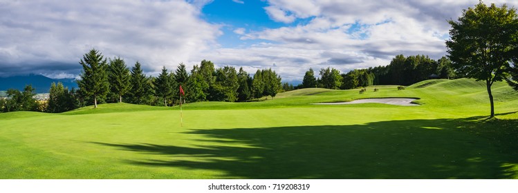Panorama view of Golf Course with putting green in Hokkaido, Japan. Golf course with a rich green turf beautiful scenery.