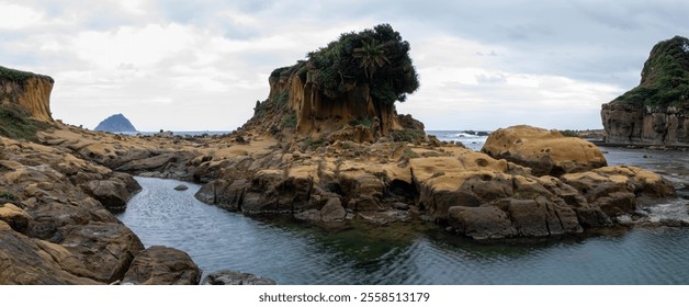 Panorama view of Heping Island's iconic rock overlooks Keelung Island, providing a breathtaking view of the vast ocean, rugged coastline, and distant islet. - Powered by Shutterstock