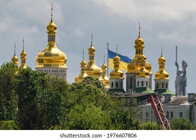 Panorama view of the Kyiv Pechersk Lavra, The Motherland Monument and Giant State Flag Of Ukraine in Kyiv, Ukraine