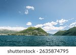 Panorama view of lake Lugano in Ticino Switzerland shot from top of Monte Bre, looking out towards mount San Salvatore
