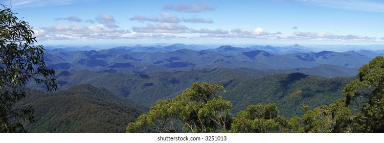 panorama of the view looking at the distant mountains (world heritage area) at point lookout with clouds at eye level