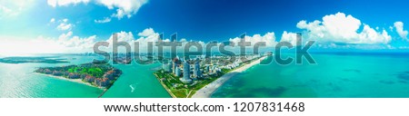 Similar – Image, Stock Photo Aerial view of Miami coastline on a cloudy day