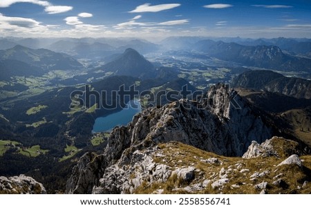 Panorama view of mount Scheffauer summit with Hintersteiner lake in foreground, austrian alps