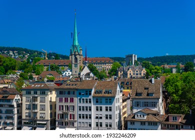 Panorama View On Zurich Houses And Imperial Abbey Of Fraumünster.  Shot Taken From A Rooftop On A Sunny And Hot Summer Day.