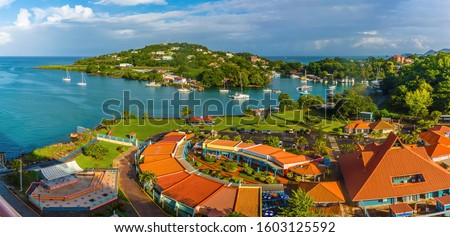 A panorama view over cruise terminal in Castries, St Lucia towards the airport in the morning
