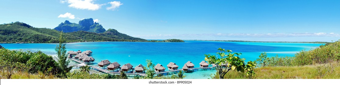  Panorama View Of Over Water Bungalow In Bora Bora , The Famous Island Of French Polynesia , South Pacific .