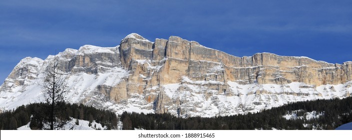 Panorama view of Sasso della Croce mountain range. Alta Badia in the Dolomites. South Tyrol, Italy.