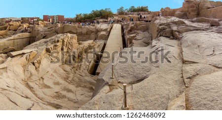 A panorama view of an unfinished obelisk in a quarry near Aswan, Egypt in summer