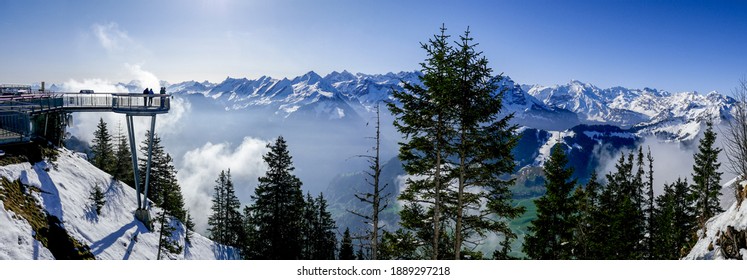 Panorama of the viewing platform and mountain ranges of the Swiss Alps (Central Alps, Bernese Alps) from Stanserhorn in the Lake Lucerne area, shot in April. 