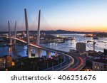 Panorama of Vladivostok at sunset, Far East Russia. Golden bridge. 
