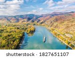 Panorama of Wachau valley with ship on Danube river during autumn in Austria