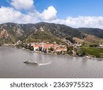 Panorama of Wachau valley (Unesco world heritage site) with ship on Danube river against Duernstein village in Lower Austria, Austria