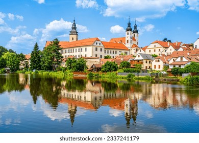 Panorama of Telč with water reflections on the lake in Telč, Czech Republic