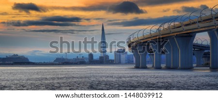 Panorama of the Western high-Speed Diameter of St. Petersburg on the background of the Gulf of Finland and late sunset