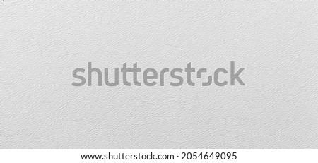 Panorama of White genuine cow leather of the sofa texture and background seamless