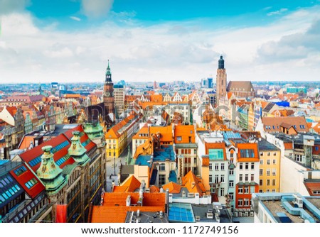 panorama of Wroclaw - bird eye view of colorful roofs of old town houses, Wroclaw, Poland, retro toned